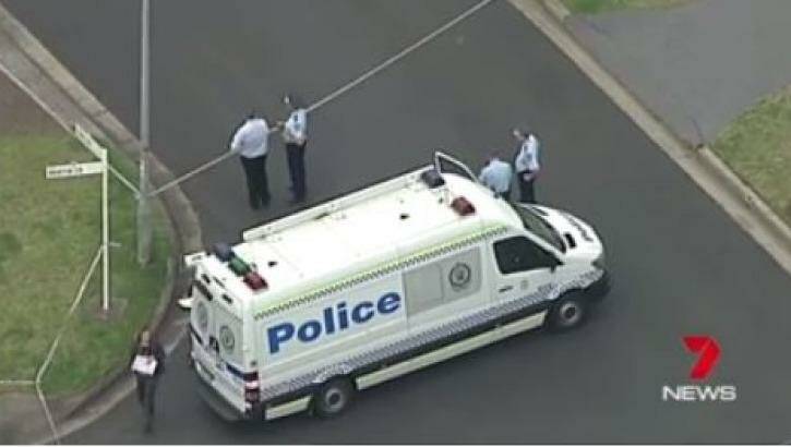 A crime scene was set up on Links Avenue at Milperra after a woman died and a man was critically injured. Photo: Channel 7
