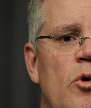 Immigration Minister Scott Morrison has referred the case against Save the Children staff to the AFP. Photo: Alex Ellinghausen