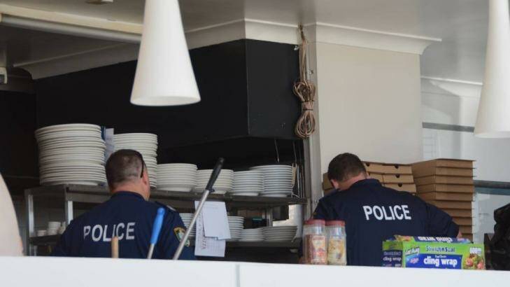 Police search a woodfire pizza business in Ulladulla as part of nine drug raids on the NSW South Coast. Photo: Supplied