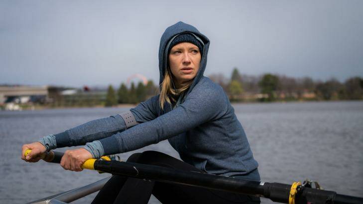 Harriet Dunkley (Anna Torv) takes an early-morning row in <i>Secret City</i>. Thankfully the show has a lot more depth than Lake Burley Griffin. Photo: Supplied