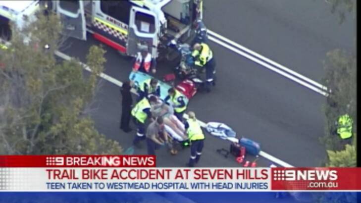 The teen is treated by paramedics before being taken to hospital. Photo: Nine News