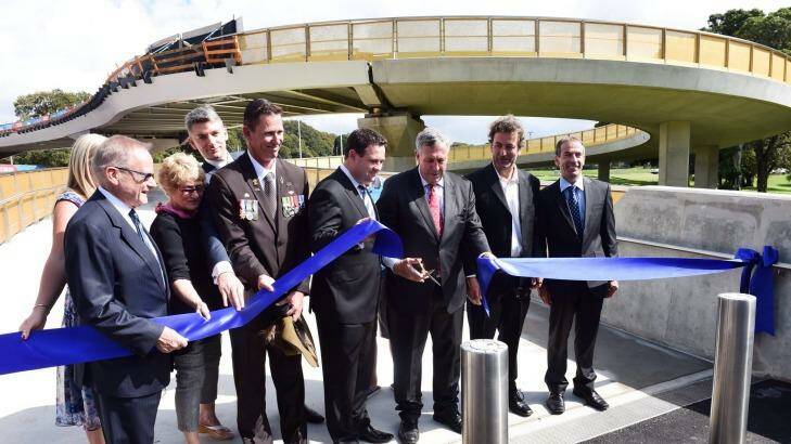 Roads Minister Duncan Gay cuts the ribbon at the bridge's opening. Photo: Nick Moir