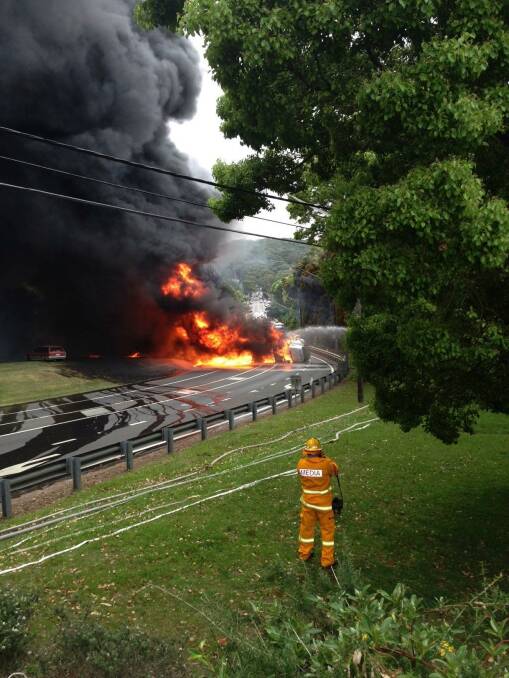 The truck ablaze on the Mona Vale bend.