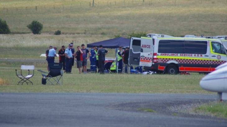 A 14-year-old boy is treated after being injured in a skydiving accident at Goulburn airport.  Photo: Darryl Fernance