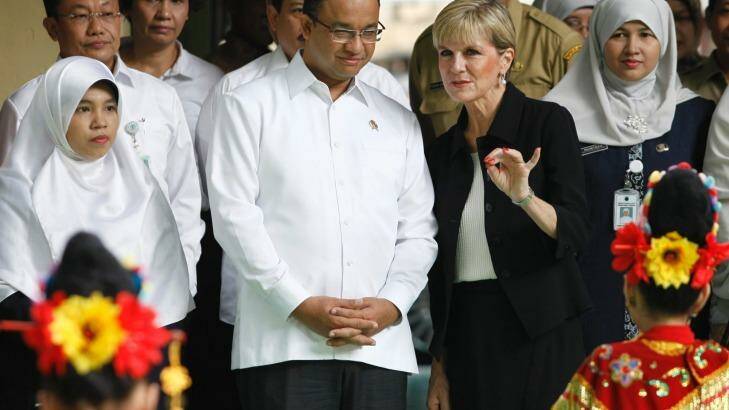 Anies Baswedan listens to Julie Bishop in the Jakarta suburb of Menteng in March 2016, when he was a minister in the Indonesian government. Photo: Irwin Fedriansyah