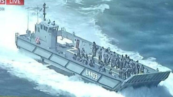 A navy vessel responds to the reports of a suspicious package at Circular Quay.  Photo: Sky News