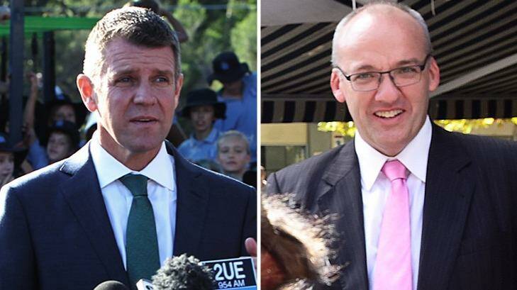 Blue and red: Mike Baird and Luke Foley campaigning on Monday.  Photo: Louise Kennerley, Nick Moir