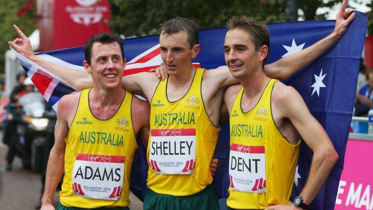 Michael Shelley, centre, celebrates his gold medal with Australian teammates Liam Adams, left, and Martin Dent, right. Photo: Gett Images