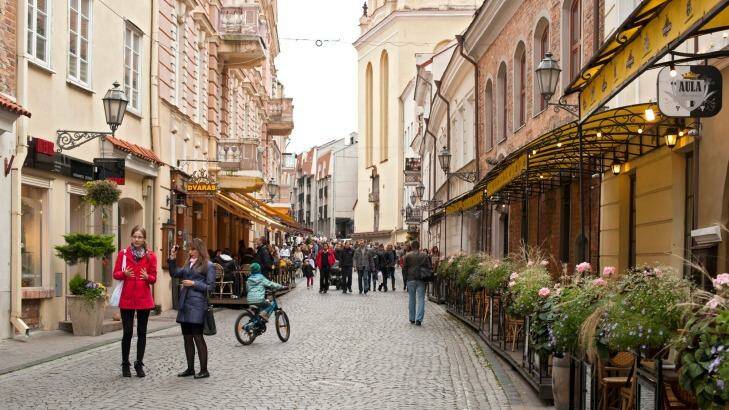 Didioji Street, the main street in the old town in Vilnius, the capital of Lithuania. Photo: Eric Nathan/Alamy