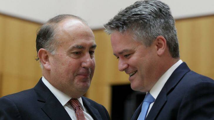 Secretary of Treasury John Fraser and Finance Minister Senator Mathias Cormann. Photo: Alex Ellinghausen