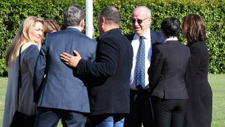 Eddie Obeid with members of his legal team and family outside the Darlinghurst Supreme Court on Monday.  Photo: Peter Rae