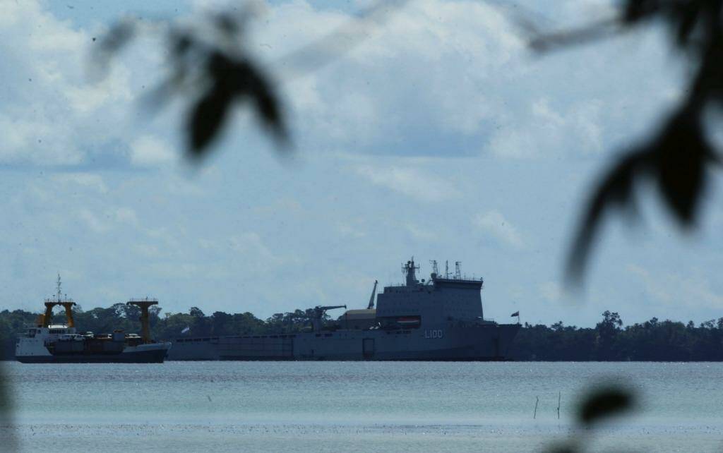 The HMAS Choules, pictured off Manus Island in 2013, is now understood to be south of Ho Chi Minh City. Photo: Kate Geraghty