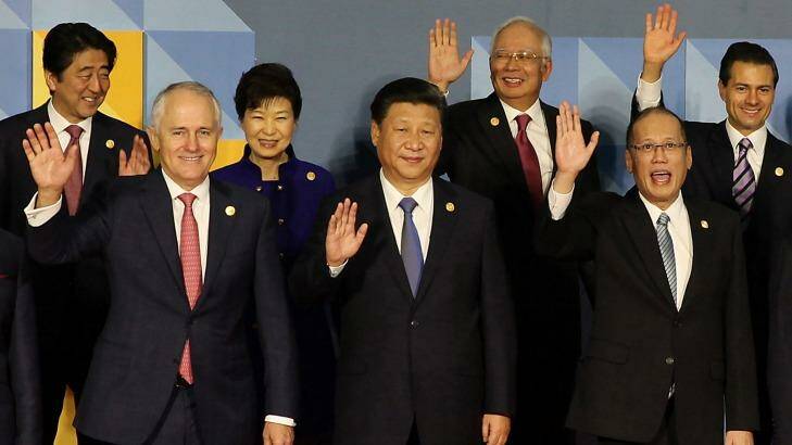 Leaders wave as they pose for a group family photo at the Asia-Pacific Economic Co-operation (APEC) summit in Manila, Philippines, in November. Pictured from top left, Japanese PM Shinzo Abe , South Korea President Park Geun-hye, Malaysian PM Najib Razak, and Mexican President Enrique Pena Nieto; front row from left, Australian PM Malcolm Turnbull, Chinese President Xi Jinping, Philippines President Benigno Aquino III. Photo: Ezra Acayan