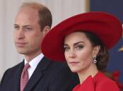 William has spent the past three-and-a-half weeks with Kate and their children. (AP PHOTO)