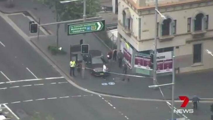 The scene at the intersection of William and Bourke streets, Woolloomooloo, where an elderly pedestrian was killed. Photo: Seven News Sydney