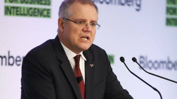 Federal Treasurer Scott Morrison says Australia's success was a tribute to 'every Australian who has gone out there, gone to work, got a job, adn is running or has started a business'.  Photo: Brendon Thorne