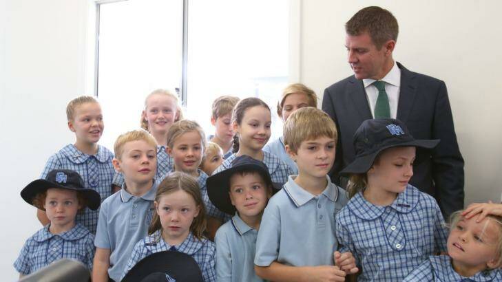 Mr Baird, with the Balgowlah students, is enjoying an approval rating of 60 per cent. Photo: Louise Kennerley