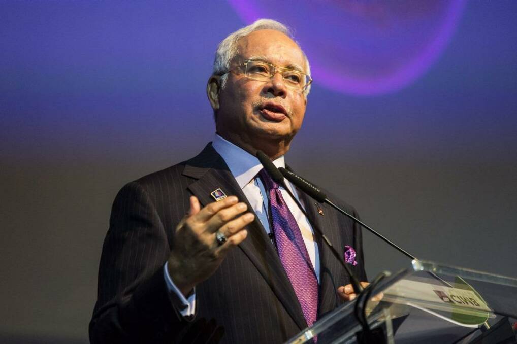 A spokesman for Najib Razak says corruption links to the Malaysian Prime Minister are 'baseless smears and insinuations'.