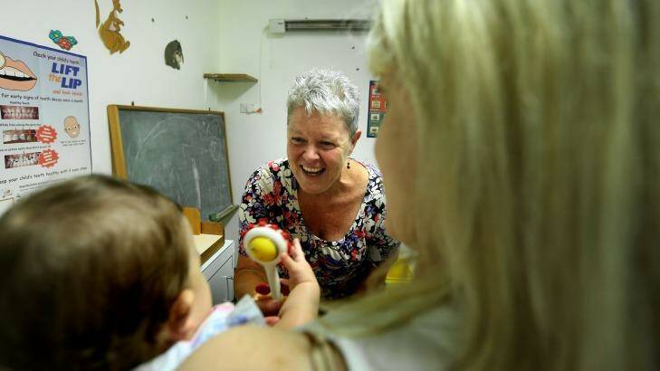 Child and family health nurse Sue Colville  with clients at the Hornsby Early Childhood Centre, Hornsby, Sydney. Photo: Kate Geraghty