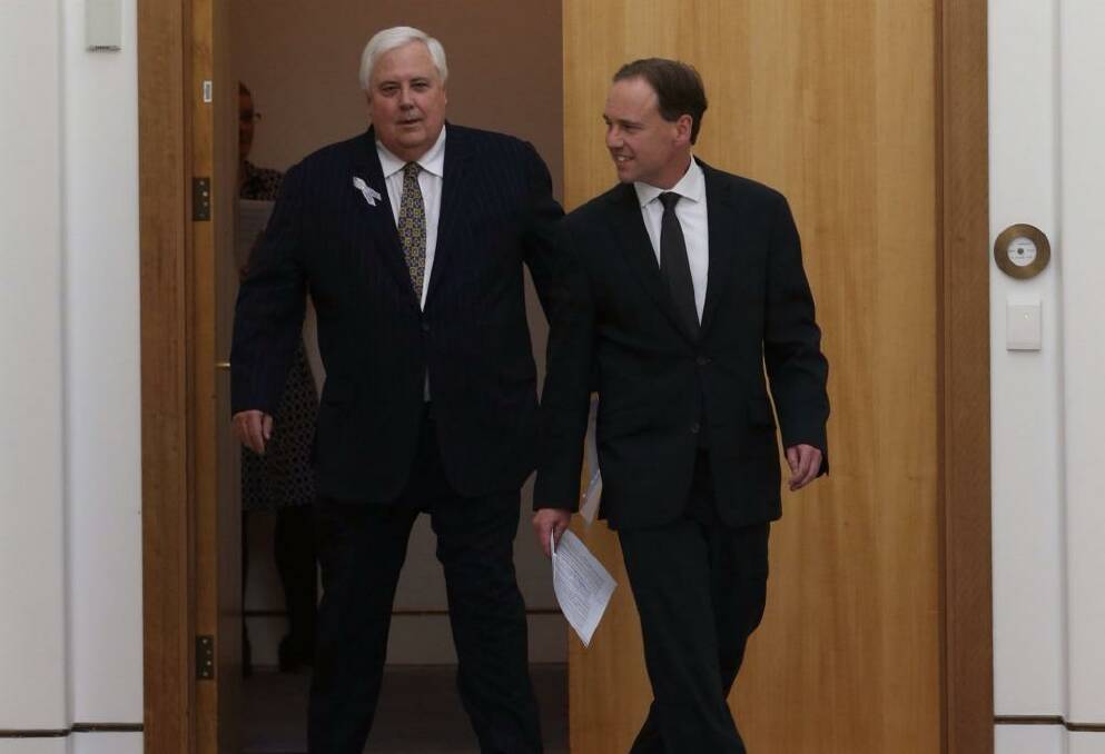 Clive Palmer and Environment Minister Greg Hunt. Photo: Andrew Meares