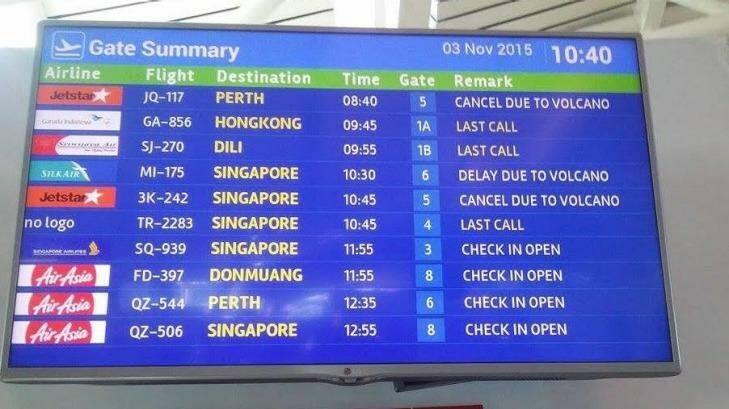 The departures board at Denpasar shows cancellations on Tuesday morning Photo: Dallas Jackson-Finn