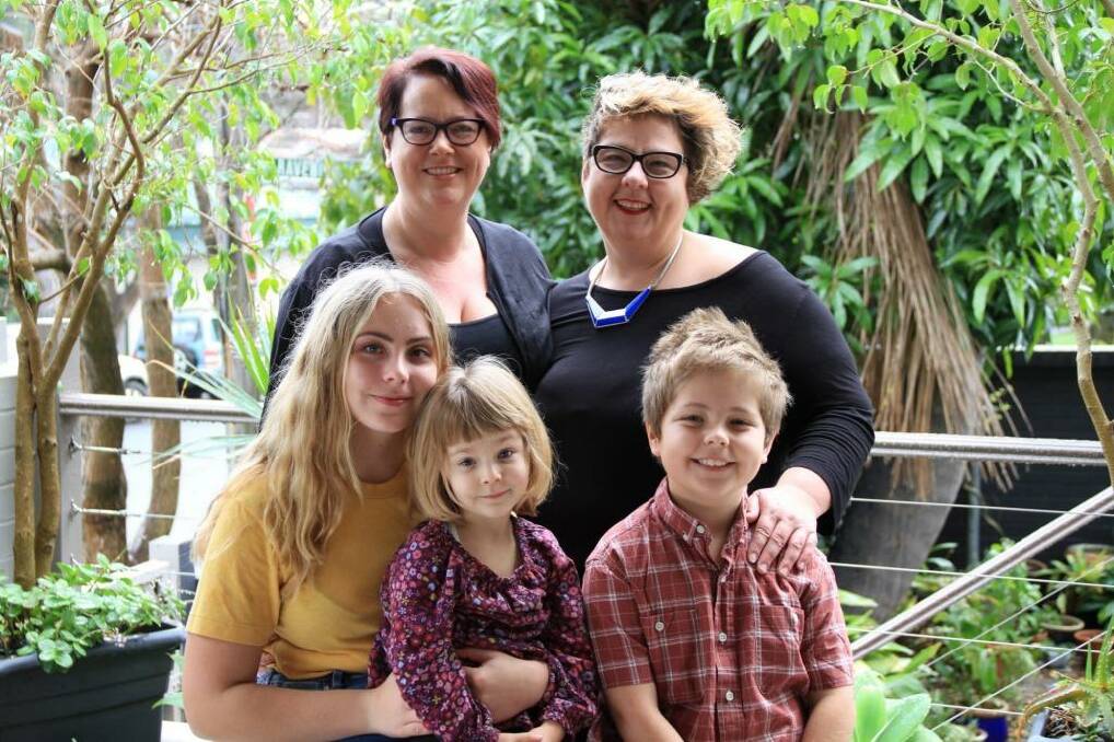 All together: Penny Sharpe, left, with partner Jo Tilly and children Jemima, 15, Pippi, 4 and Red, 10.