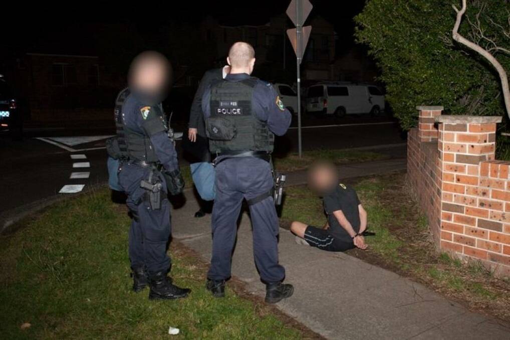 NSW Police officers execute search warrants in raids across Sydney on Thursday, September 18. Photo: NSW Police
