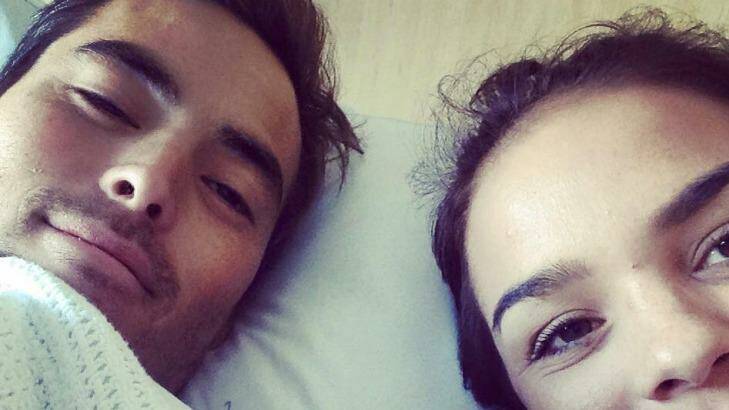 Mathew Lee, pictured in hospital with his girlfriend, Suzy Gerada. Photo: Facebook
