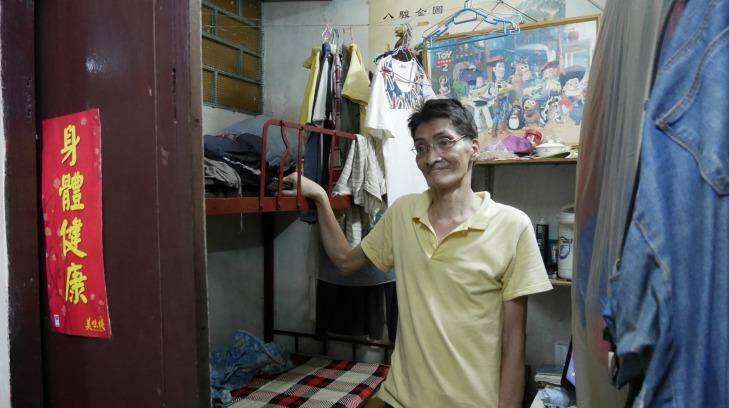 Hard to find work: Lam Ip-sang, in his sub-divided flat. Photo: Philip Wen