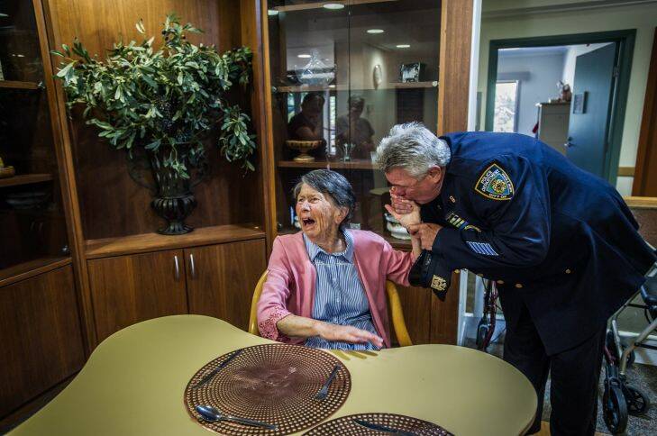 Uniting Care Mirinjani retirement village has granted a lifelong wish for resident Berenice Benson to meet a real New York city cop (something she mentions every tine she gets into the facility lift featuring a poster of the New York skyline). NYPD Detective Howard Shank was glad to accommodate. Photo by Karleen Minney.