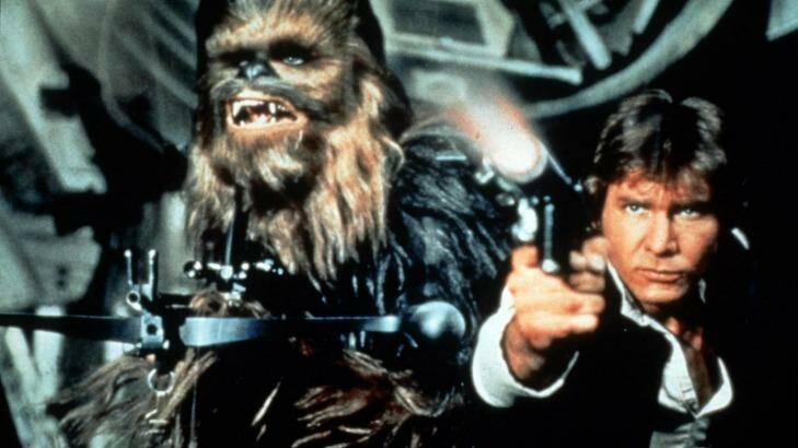 David Prowse as Darth Vader in <i>The Empire Strikes Back</i> (left); Chewbacca (Peter Mayhew) and Han Solo (Harrison Ford) unload (right). Photo: supplied