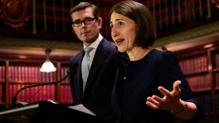 NSW Premier Gladys Berejiklian speaks at a press conference with Treasurer Dominic Perrottet. Photo: Wolter Peeters