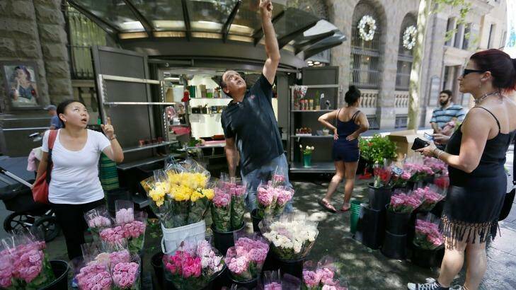 Florist Tony Scaltriti has had the busiest week all year selling flowers. Photo: Michelle Mossop