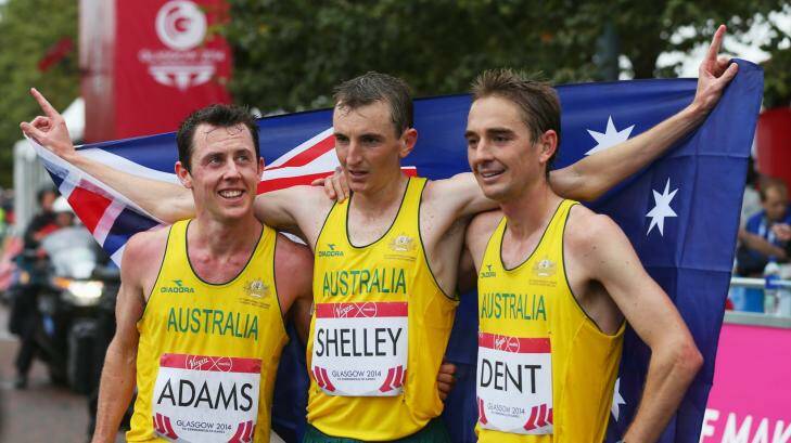 Michael Shelley, centre, celebrates his gold medal with Australian teammates Liam Adams, left, and Martin Dent, right. Photo: Gett Images