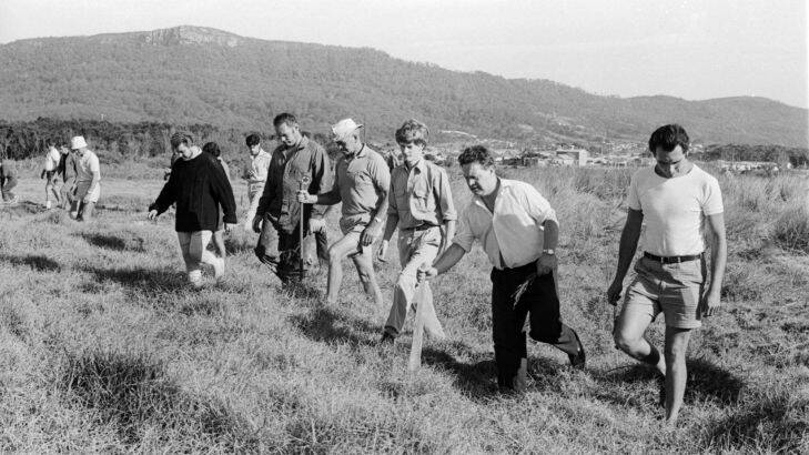 Police and volunteers search for three-year-old girl, Cheryl Grimmer, who disappeared from Fairy Meadow Beach, NSW, the day before. Picture taken 13 January 1970.
SMH Picture by John Elliott

AF086/45

Kidnapping, kidnapped, child, crime, abduction, abducted, ransom, black and white, history, archival, 1970s Photo: John Elliott