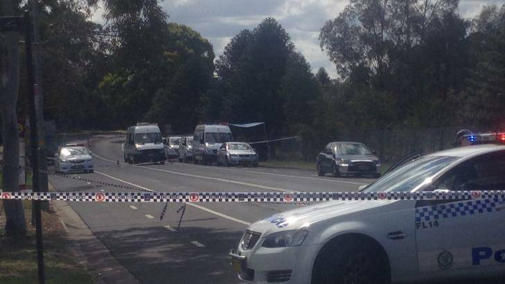 Crime scene: Police have closed off a section of East Street, Lidcombe. Photo: Marcus Strom