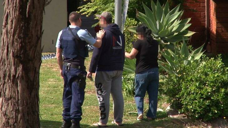 A distraught friend or relative is comforted at the scene in Sturt Avenue on Tuesday. Photo: TNV News