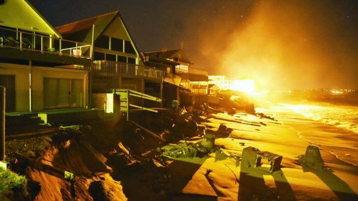 Houses at Collaroy in the early hours of Tuesday morning.  Photo: Nick Moir