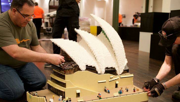 Lego builder Ryan McNaught, left, and his Opera House. 
 Photo: Wolter Peeters