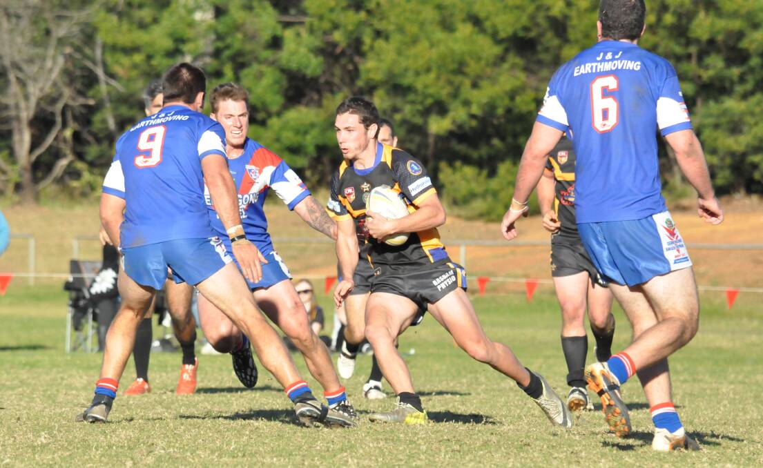 HARD YARDS: Winger James Jaggot takes a run for his Jets against the Gerringong Lions. Photos: DAMIAN McGILL