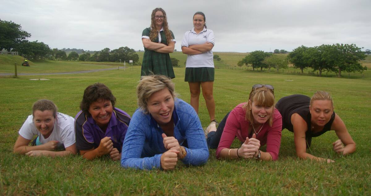 BRING IT ON: Gearing up for Saturday’s Shoalhaven Mud Muster are tough mums Stacy Wilesmith (left), Kim Roughley, Fiona Butson, Zoie Collett, Carla West and youngsters Abbie Wilesmith (back left) and Baylee Roughley.