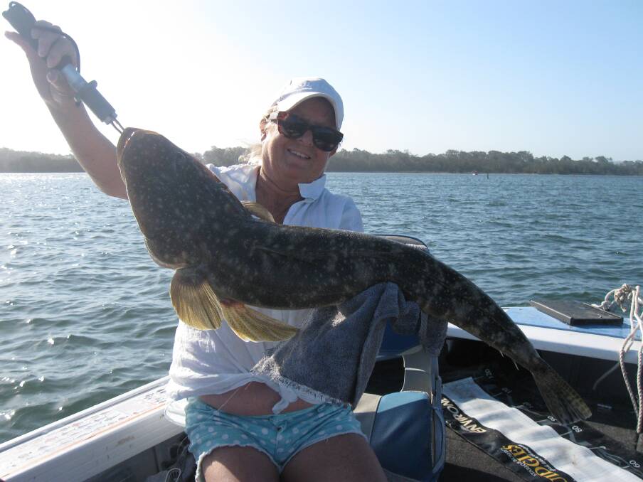 Catch of the Day (No. 20): Pam Feeley caught this cracker 90cm flathead on a poddy mullet in Tuross Lake along with an 73cm and 79cm model, all three flathead were released. 