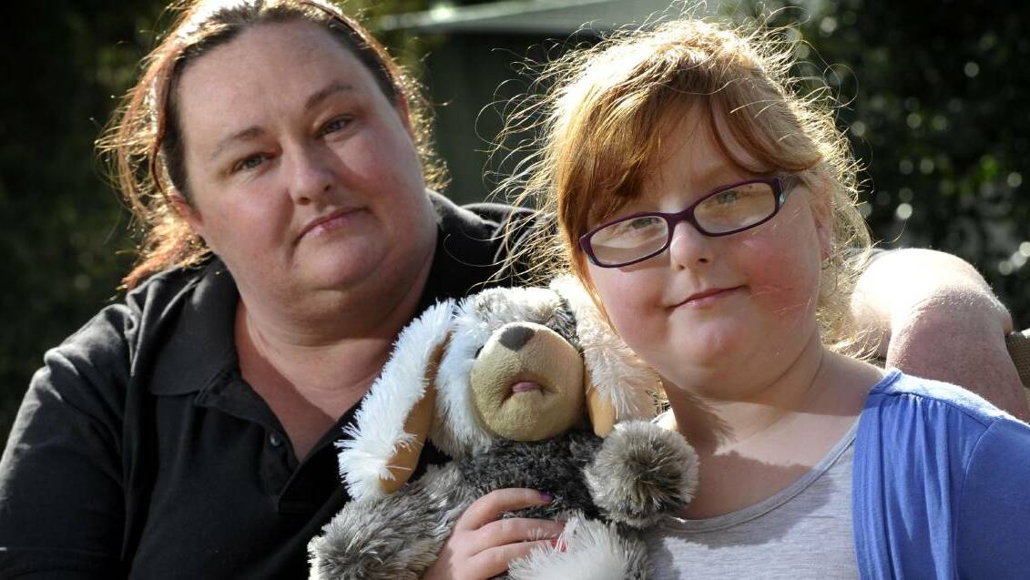 TIME FOR CHANGE: Wagga mum Lizzie Macquarie with daughter Lillian, 8, who suffers from epilepsy. Medical marijuana may be Lillian's best chance of reducing her seizures. 