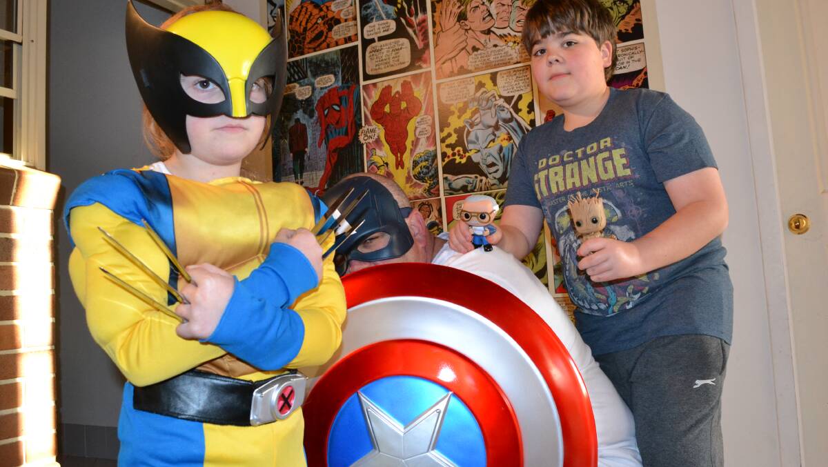 FAMILY AFFAIR: Shoalhaven Police Inspector Steve Johnson, AKA Captain America, with his children Molly as Wolverine and Flynn, a Dr Strange aficionado, can’t wait for the Shoalhaven Superheroes Festival.