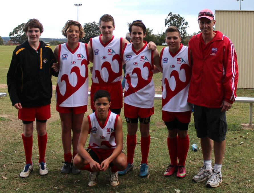 BEST EFFORT: Shoalhaven under 16 representative players (back) Caleb Broughton, Mitch Lawrence, Nathan Hyam, Dale Lovatt, Ashton Paisley-Topp, coach Col Lawrence and (front) Slade Wellington. 