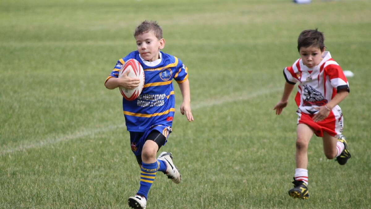 BREAKAWAY: Bomaderry Swamp Rats under 7’s player Kynan Miller scores one of his two tries in his team’s 24-14 win over St Georges Basin last weekend. 