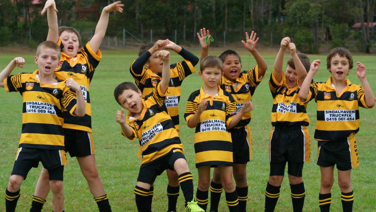 CELEBRATE GOOD TIMES: Nowra Warrior Wallabies under eight team finally celebrate the start of the playing season before taking to the field.