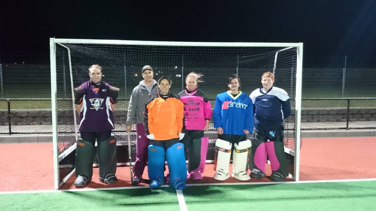 GETTING THE GOOD OIL: Australian men’s hockey keeper Nathan Burgers with Shoalhaven goalies at the Wollongong clinic (from left) Belinda Finlay, Vanessa Lloyd, Rhian Williams and Nick Crawford. 