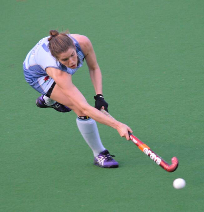 NATIONAL GOLD: Kyah Gray tears up the hockey courts for NSW at the Australian Championships.