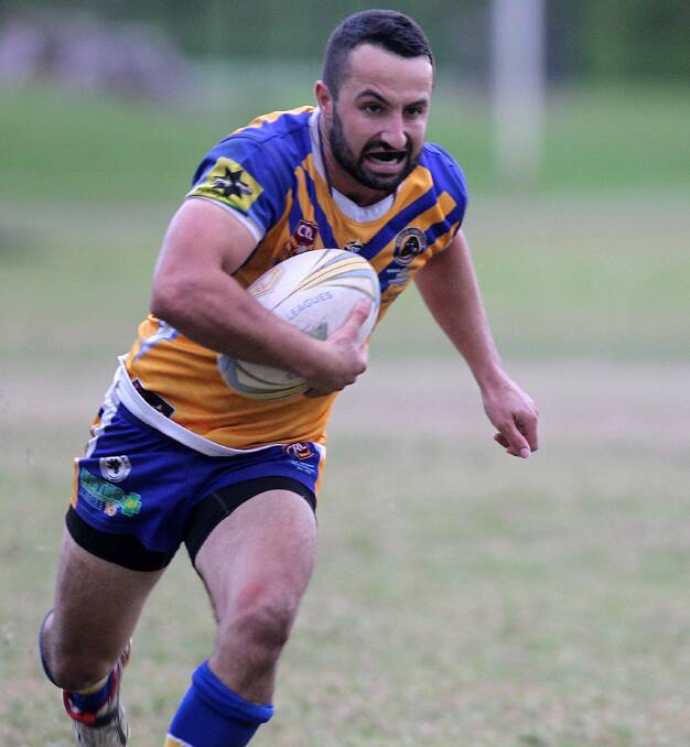 MAN ON A MISSION: Warilla-Lake South Gorillas' Nick Lazarevski powers through with the ball against the Jamberoo Superoos on Saturday. Photo: DAVID HALL